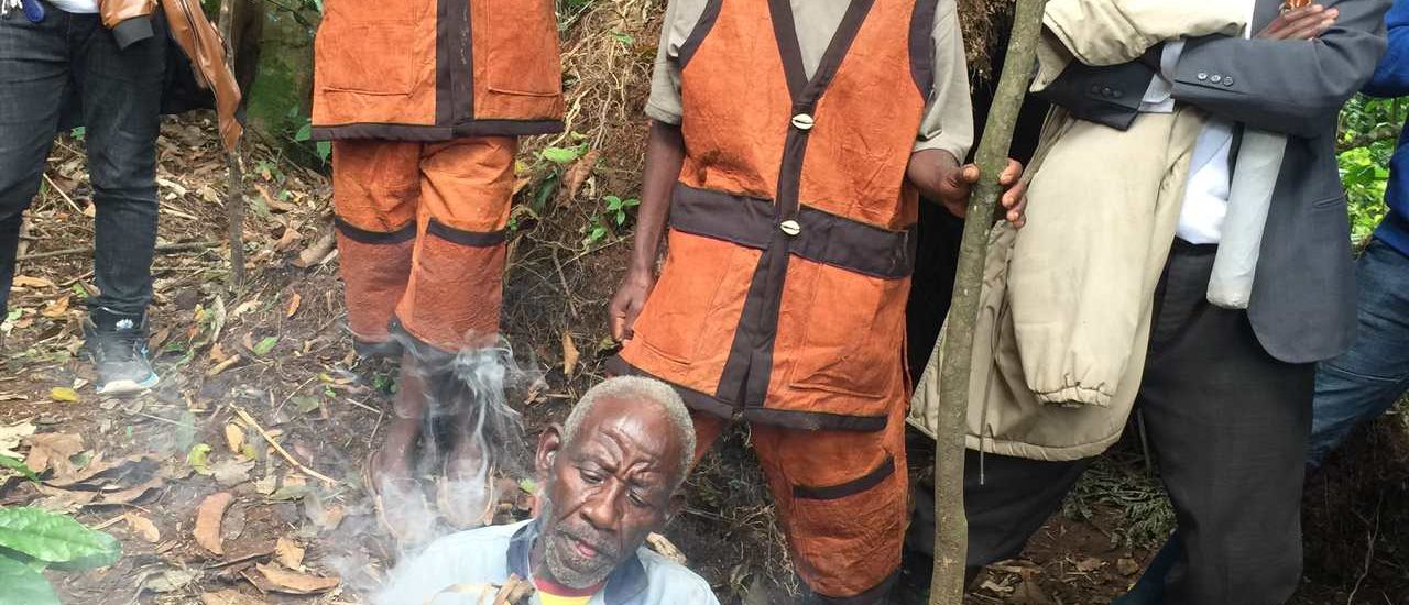 Batwa demonstrating making fire using forest trees on the Batwa Forest Experience_Easy-Resize.com