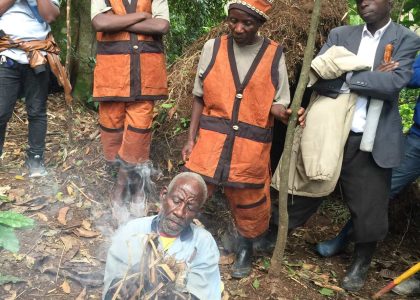 Batwa demonstrating making fire using forest trees on the Batwa Forest Experience_Easy-Resize.com